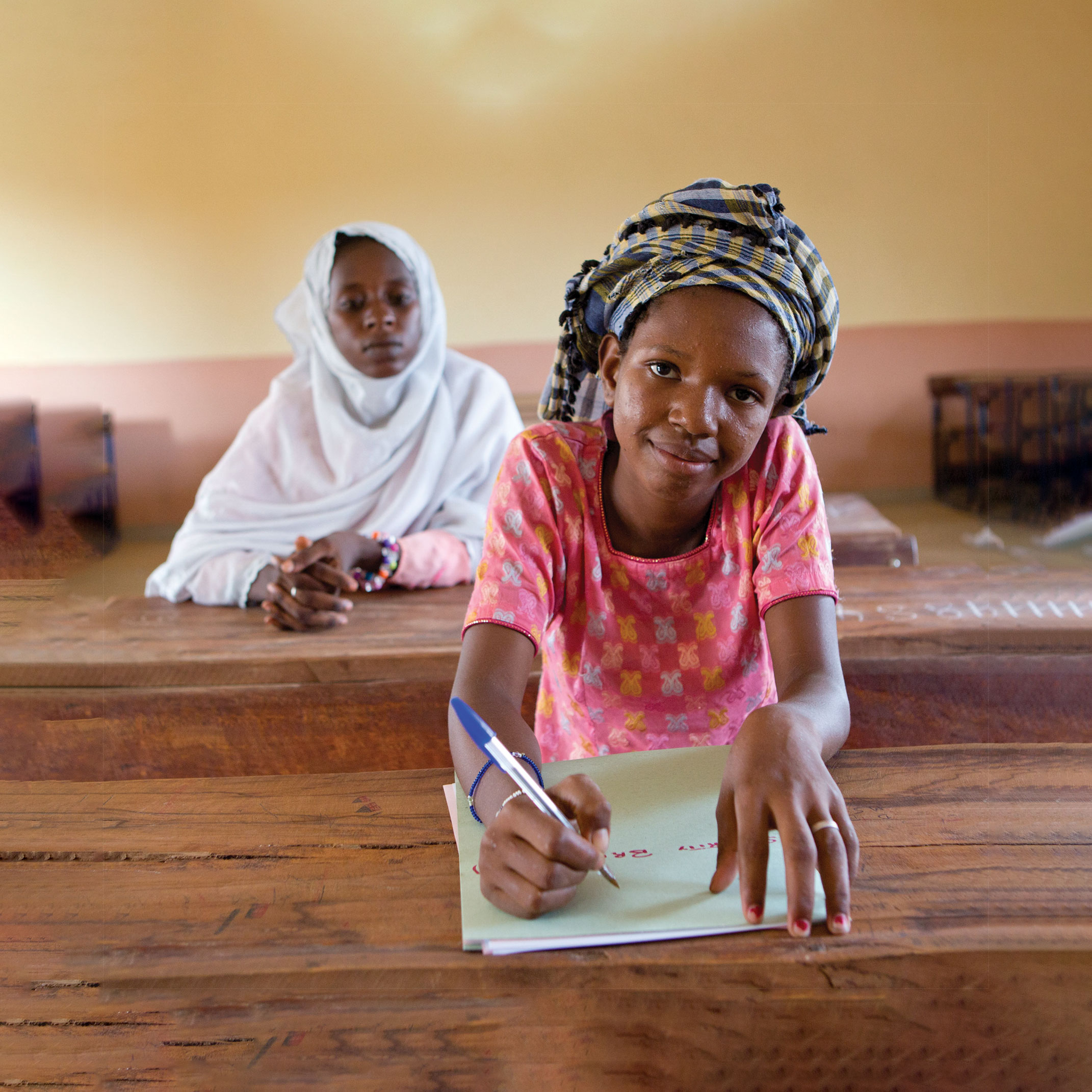 A girl at school supported by Plan UK's Girl Fund