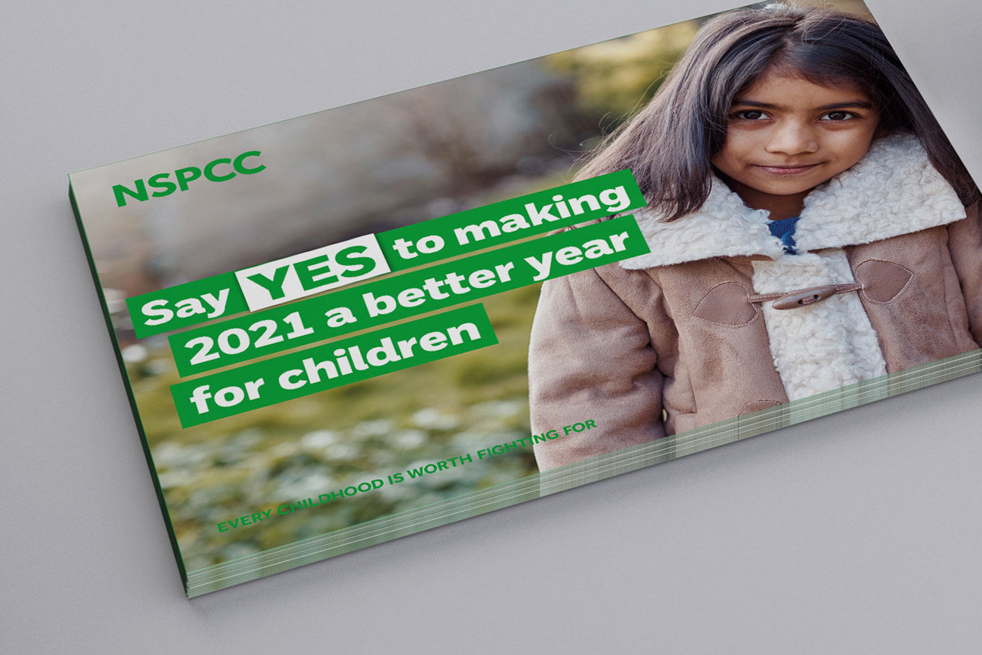 Image of outer envelope showing girl with headline "Say yes to making 2021 a better year for children"